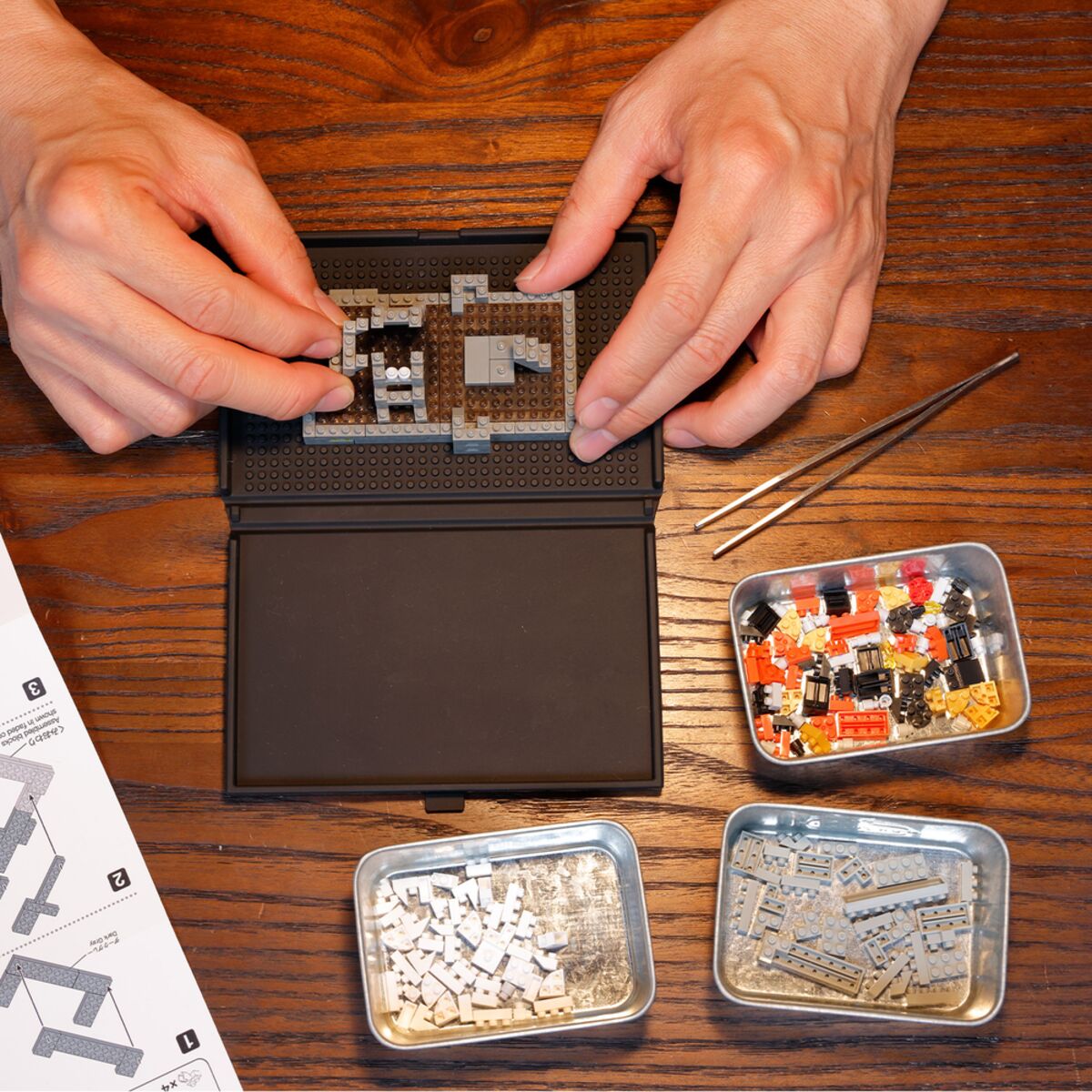 Sorting nanoblock pieces in trays before a build