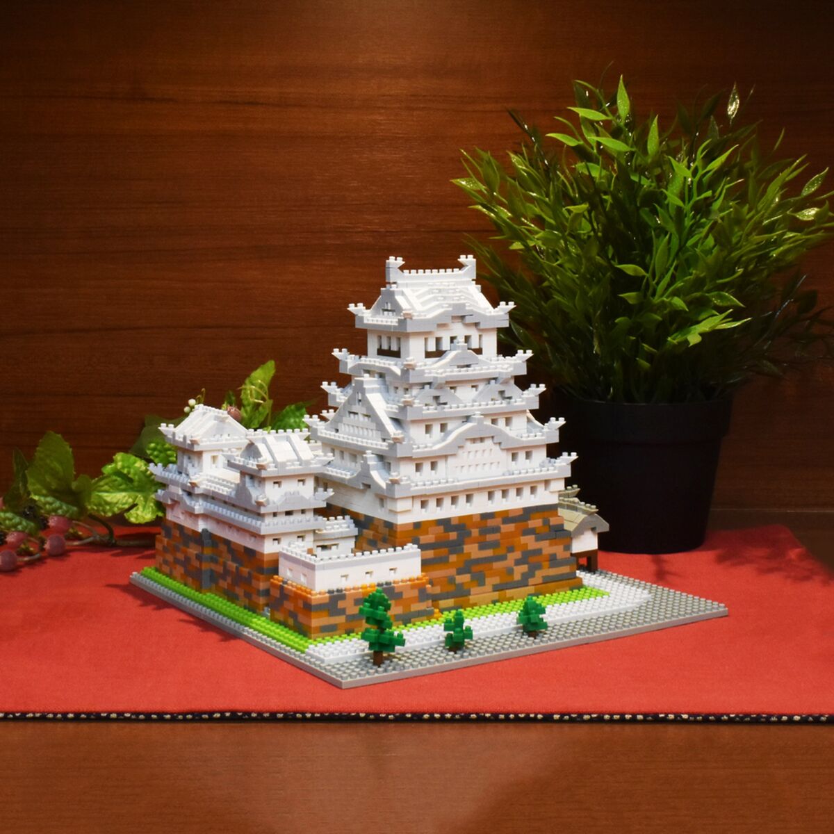 nanoblock Himeji Castle beside a pot plant